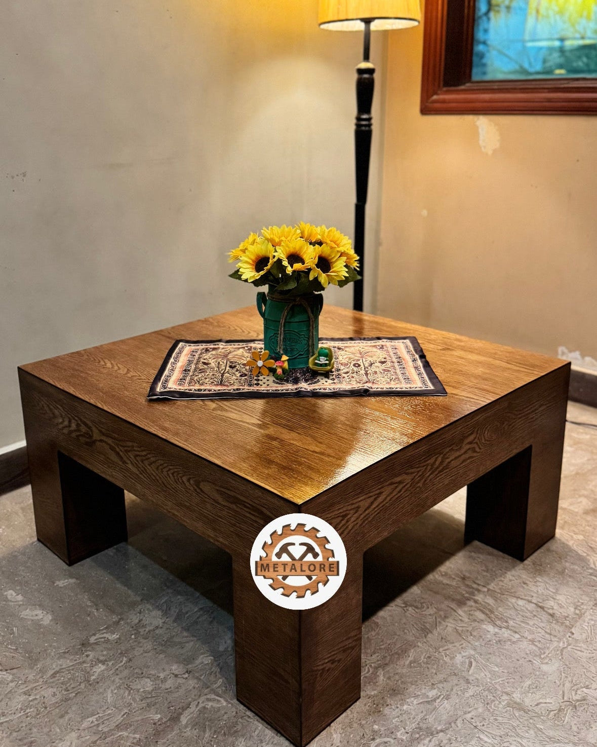 Rustic square wood coffee table with block legs in living room corner